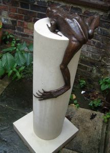 Frog on pillar